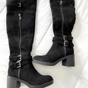 Black guess high boots